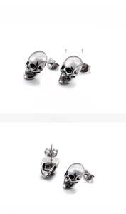 Detail view of gothic skull earrings in stainless steel with 9x13mm size measurements