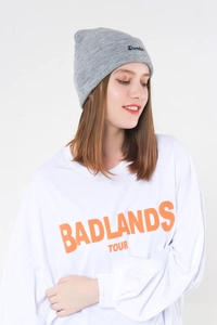 Detailed view of light grey knit beanie with black script embroidery and white cotton tshirt