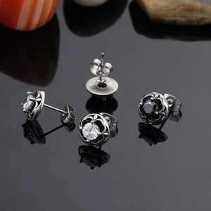 Vintage titanium steel stud earrings set with black and white cubic zirconia stones