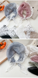 Close-up of floral lace edges and textured fabric on pastoral triangle headscarves