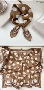 Detail of vintage brown square silk scarf featuring white polka dots and chain border
