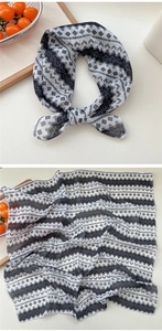 Detail of black and white geometric pattern cotton linen scarf tied in a bow
