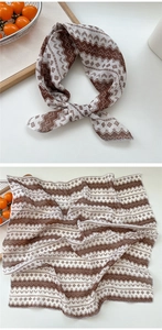 Detail of vintage geometric jacquard cotton linen scarf with zigzag patterns