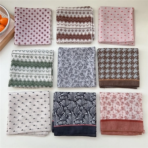Set of 9 vintage linen square scarves with diverse geometric and floral patterns