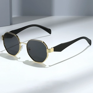 Octagonal polygon metal frame sunglasses with gold finish and black lenses in a chic style