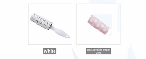 Close-up of portable lint roller with a white handle and replaceable paper refills