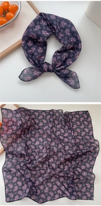 Detail of soft cotton linen square scarf with pink paisley pattern on navy blue fabric