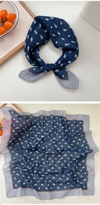 Detail of equestrian horse print cotton linen scarf with navy and grey border pattern