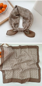 Detail showing vintage houndstooth pattern and premium edge stitching on soft cotton scarf