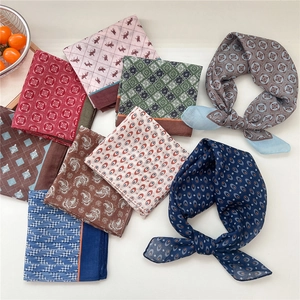 Elegant cotton linen neck scarves with paisley and geometric prints in various colors