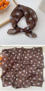 Detailed view of brown floral cotton linen neckerchief with elegant blue patterns