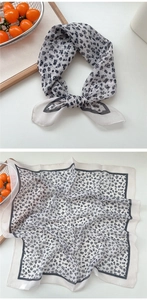 Detail view of cotton linen square scarf with vintage floral print and grey border