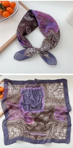 Detail of soft breathable paisley floral square scarf in purple and brown shades
