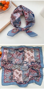 Detail view showing Paisley print and premium fabric texture of this elegant square scarf