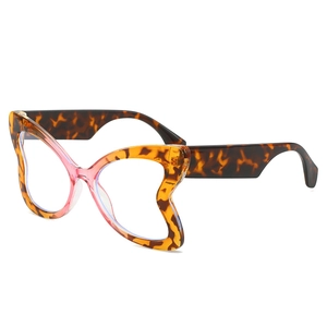 Modern butterfly-shaped sunglasses with leopard tortoise pattern and gradient nose bridge