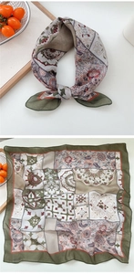 Detail of vintage bohemian floral cotton scarf with paisley patterns and fine stitching