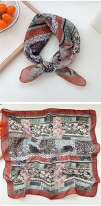 Detail of vintage bohemian floral print scarf with soft breathable cotton linen texture