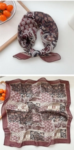 Detail of red and beige vintage floral square scarf with light breathable cotton texture