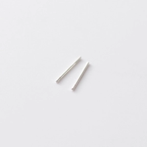 Minimalist sterling silver ear sticks for hole maintenance set of two on white background