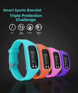 Silicone fitness tracker set in blue, orange, pink, and purple with LCD step counters