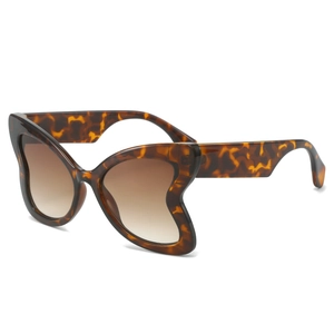 Modern oversized butterfly sunglasses with tortoise shell frames and brown gradient lenses