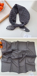 Detail of black polka dot cotton linen square scarf with geometric floral pattern