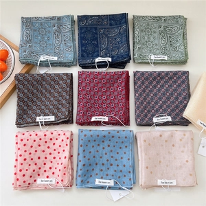 Nine-grid display of various polka dot and paisley linen cotton square neck scarves