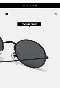Macro detail of retro oval sunglasses with textured metal frame and dark circular lens