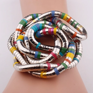 Silver flexible snake-shaped bracelet with multicolor enamel stripes in a coiled design