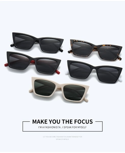 Close-up of stylish cat-eye sunglasses collection in five vibrant color combinations