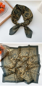 Detail view showing retro butterfly pattern on dark green square silk neck scarf