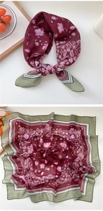 Close-up of floral square silk scarf with wine red base and olive green border detail