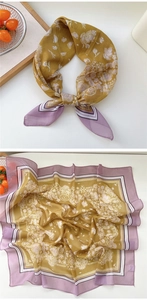 Detailed view of ginger and lilac silk square scarf with vintage white floral pattern