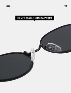 Detailed close-up of adjustable silicone nose pads on retro oval punk sunglasses