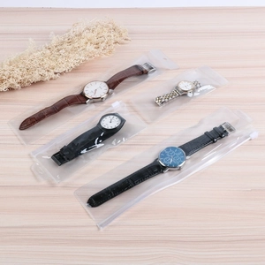 Detail of four frosted EVA slider bags with hanging holes for organizing watches and jewelry