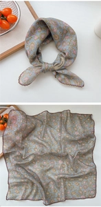 Floral cotton silk scarf with wave edges and blue base featuring vintage flower patterns