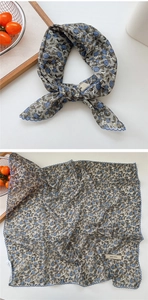Detail view of square floral scarf with scalloped embroidery and explore infinity label
