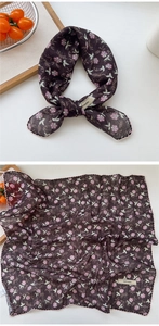 Detail view of cotton-linen feel floral scarf with pink edges and vintage pattern