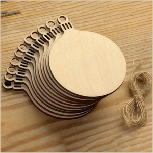 Detailed view of stacked blank round wooden ornaments with natural jute twine bundle
