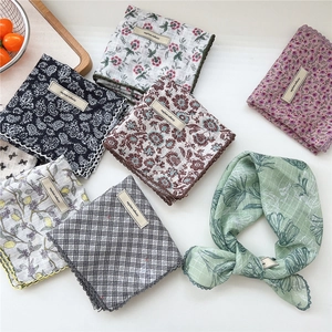 Assorted paisley and floral cotton linen scarves with lace edges and explore infinity labels