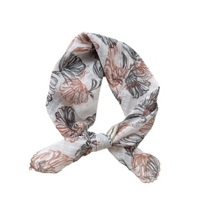 Floral cotton linen square scarf in cream with orange flower patterns and stitched edges