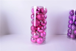 Close-up of 24-piece rose red Christmas ball ornaments in clear cylinder packaging