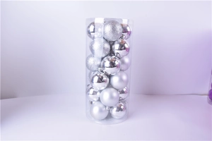 Detail of 3cm silver Christmas balls in glossy, matte, and glitter finishes in a clear tube