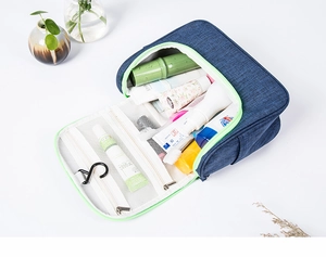 Large blue travel toiletry bag with hanging hook and multiple mesh compartments