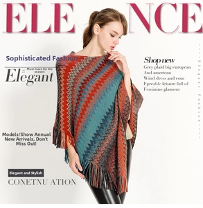 Detailed view of colorful zigzag knit poncho with long fringe tassels and vibrant patterns