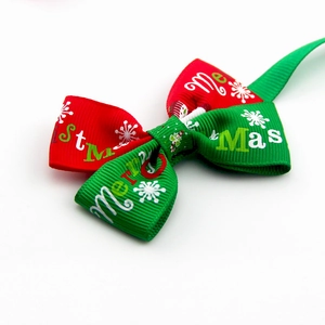 Christmas bow tie for pets in red and green ribbon with Merry Christmas snowflake print
