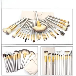 Detail of portable horse hair eyeshadow brush set with beige folding storage bag