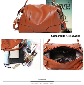 Detail view of large capacity brown pebbled leather tote showing spacious multi-layer interior