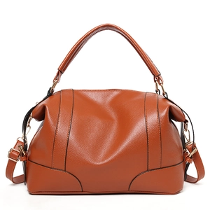 Caramel brown pebbled leather Boston handbag with detachable strap and gold hardware