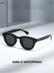 Detail view of classic black thick-frame sunglasses with elegant diamond metal rivets